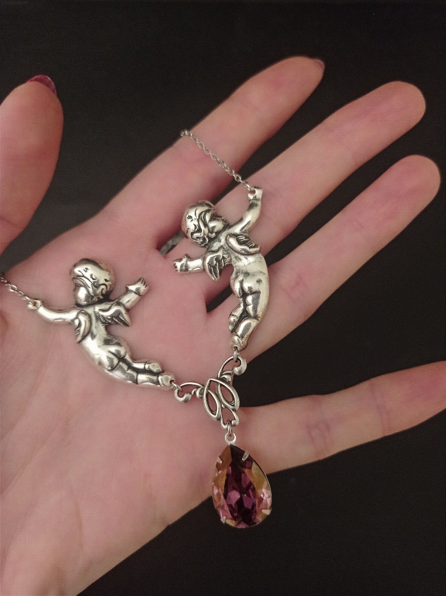 Cherub necklace and earrings set