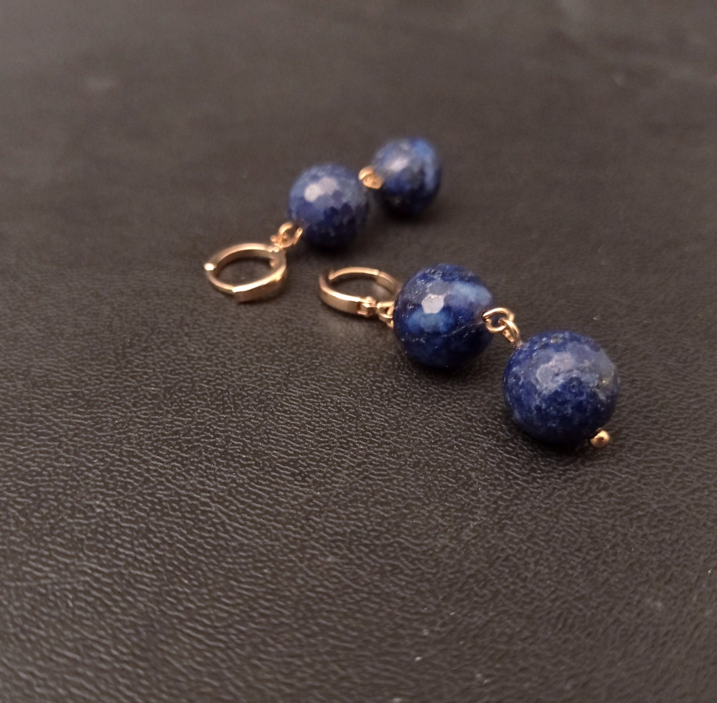 This is a pair of 24k gold plated earrings with natural Lapis Lazuli beads. They have a nice weight to them and dangle beautifully. They are approximately 4cm long including the earwires.