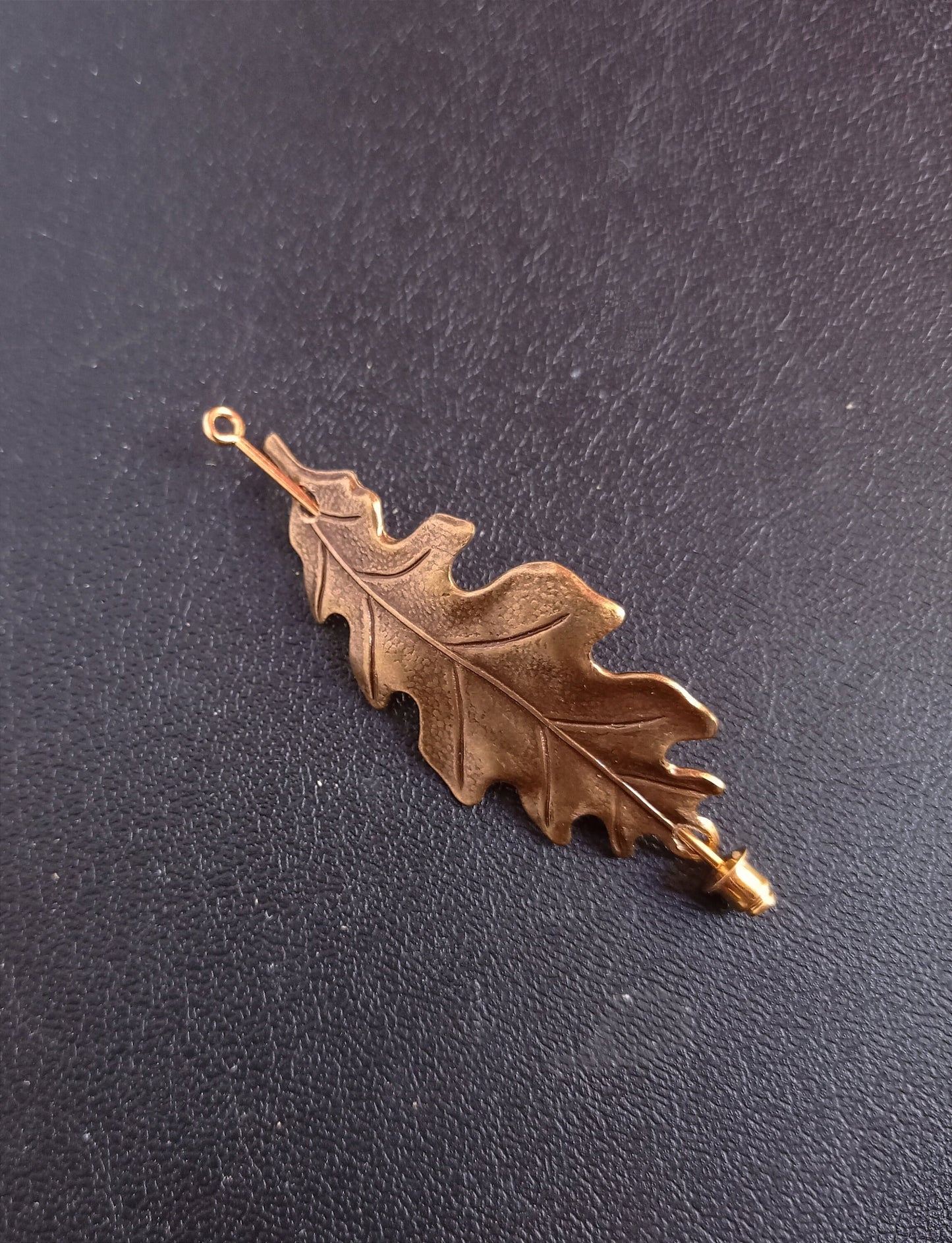 Brass oak leaf brooch