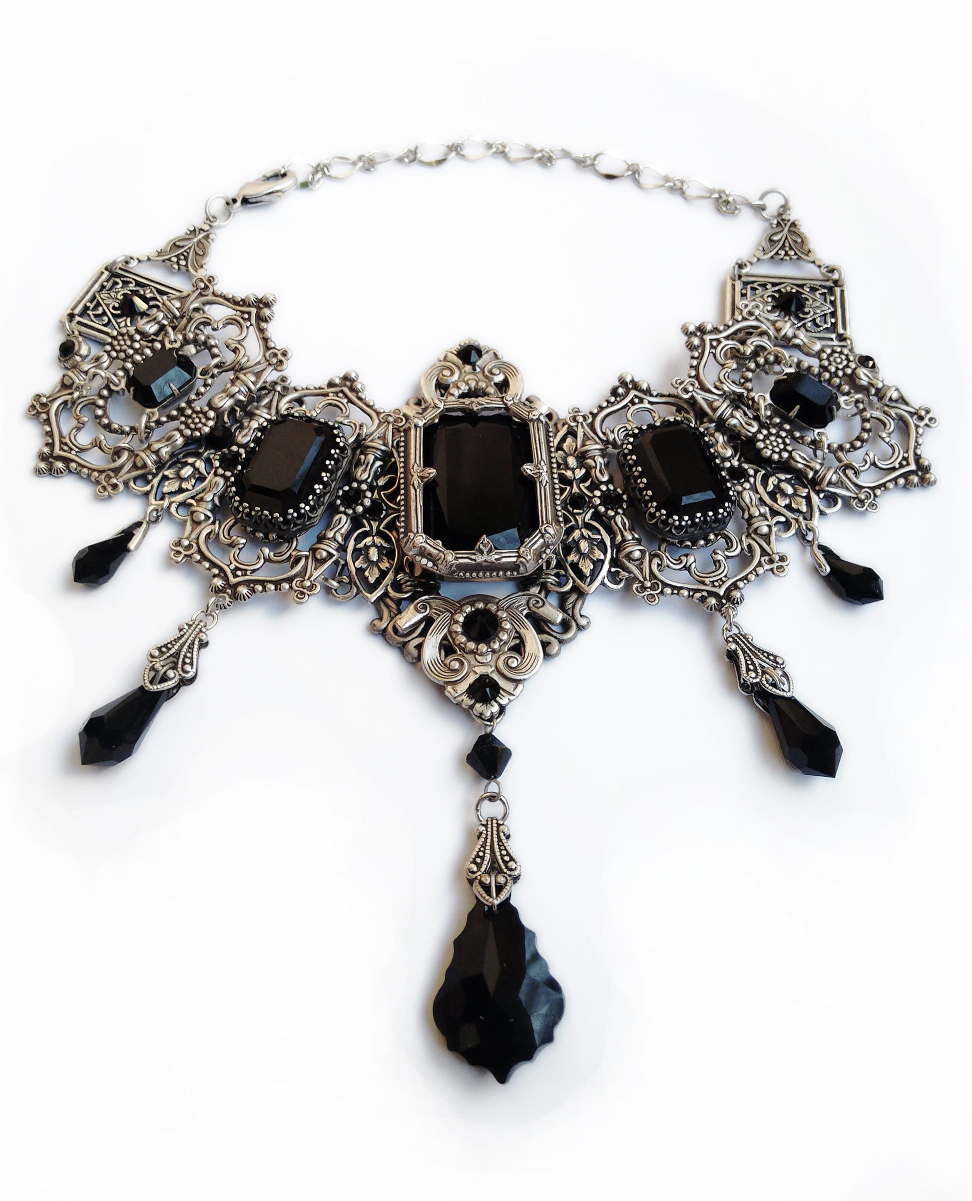 Elegant black and silver Gothic necklace featuring a striking large stone, perfect for making a bold fashion statement.