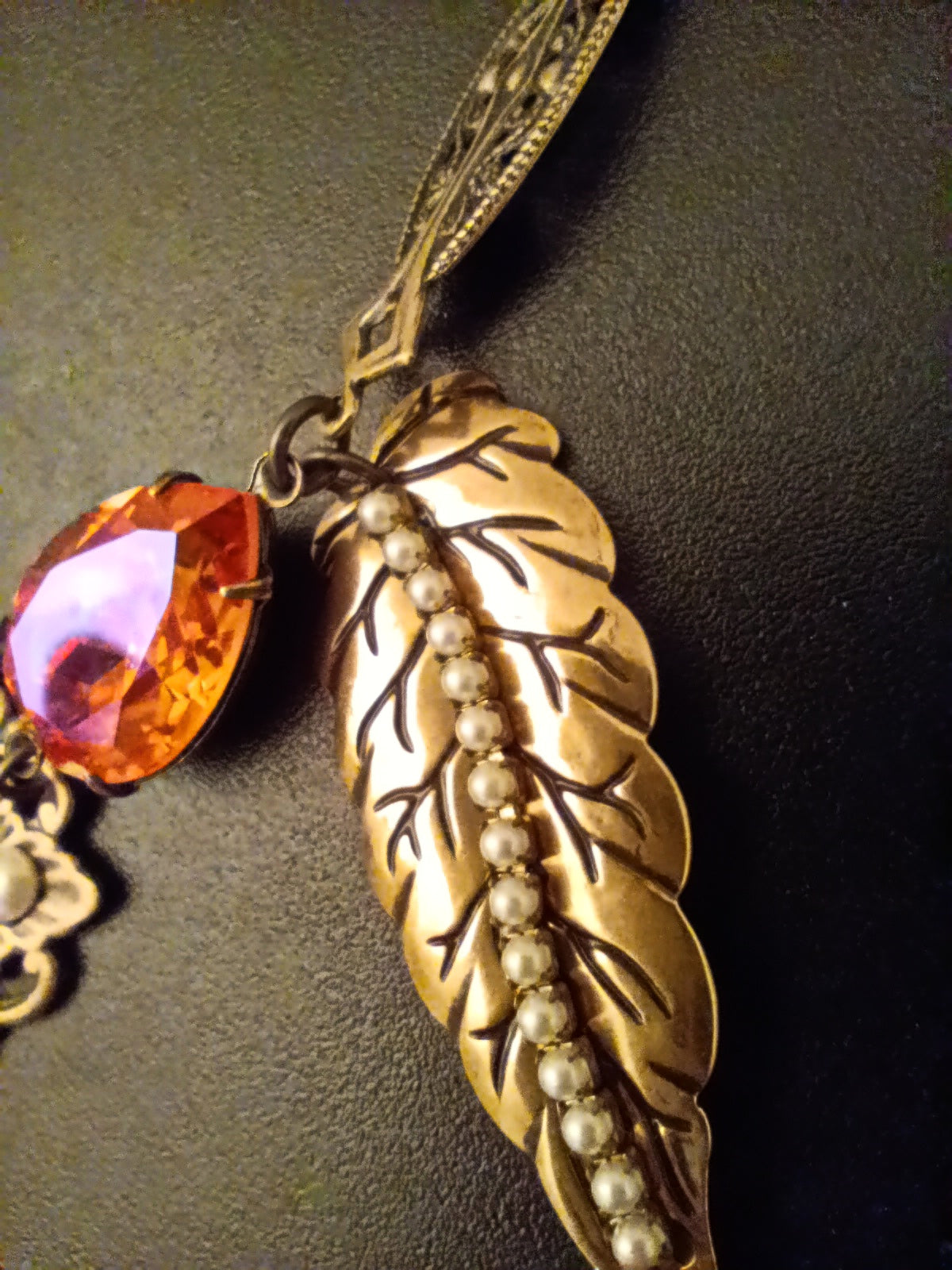 Brass filigree butterfly and red crystals necklace