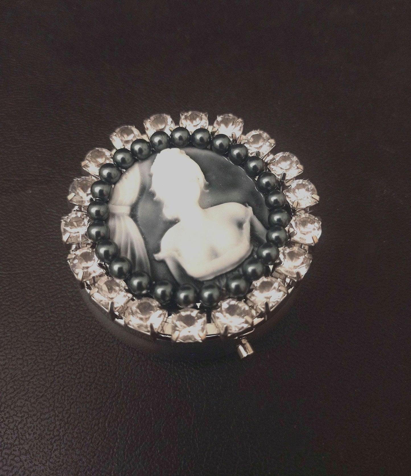 Pillbox with gray pearls and cameo