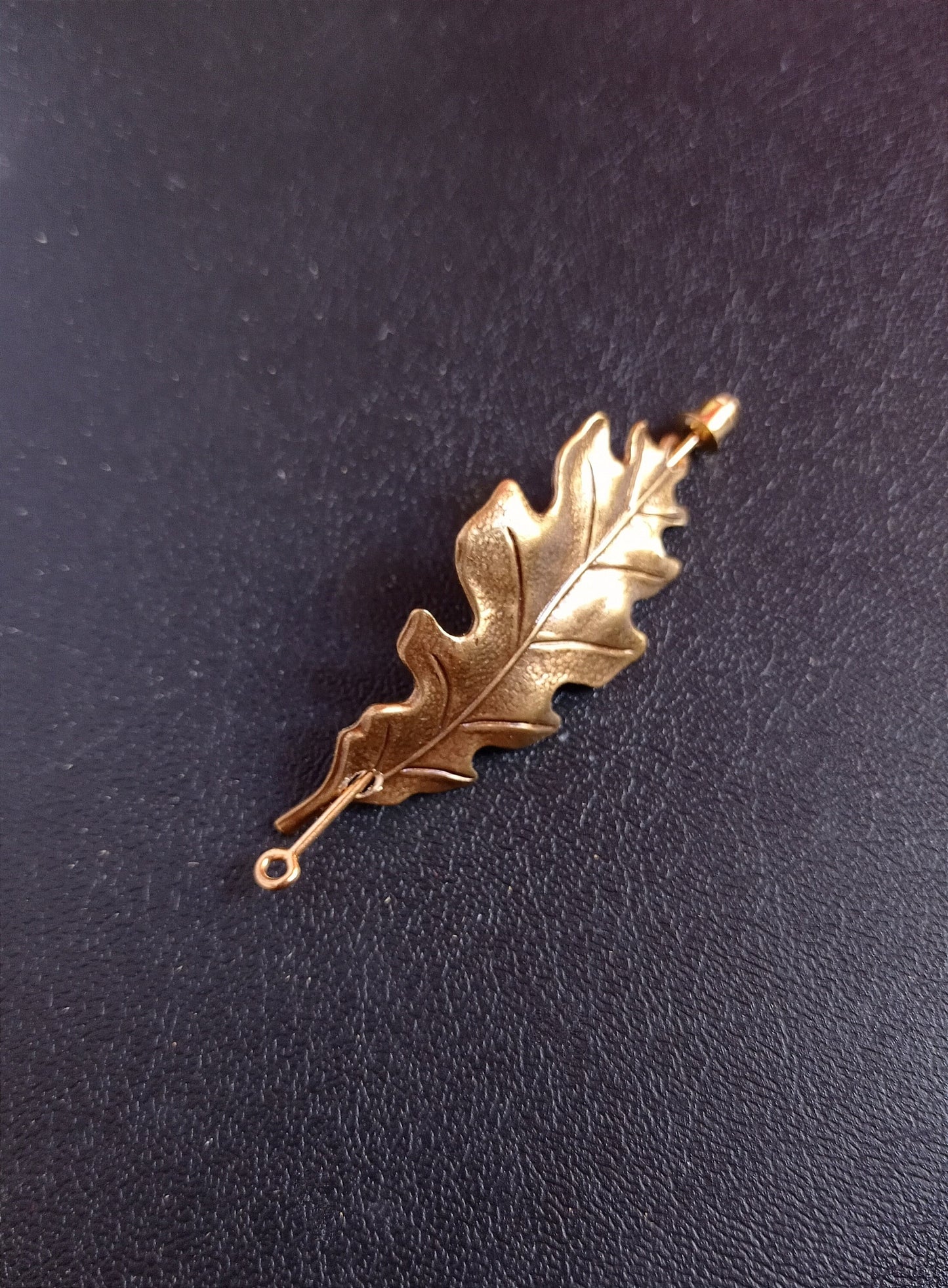 Brass oak leaf brooch