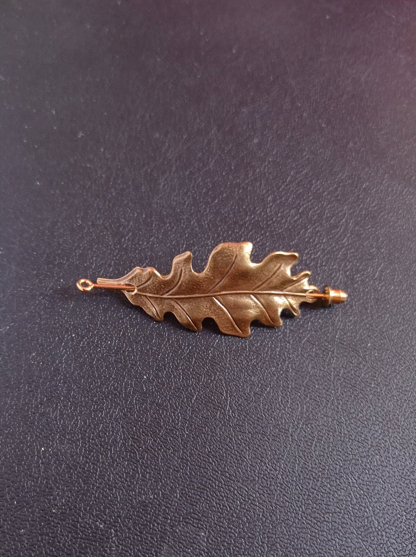 Brass oak leaf brooch