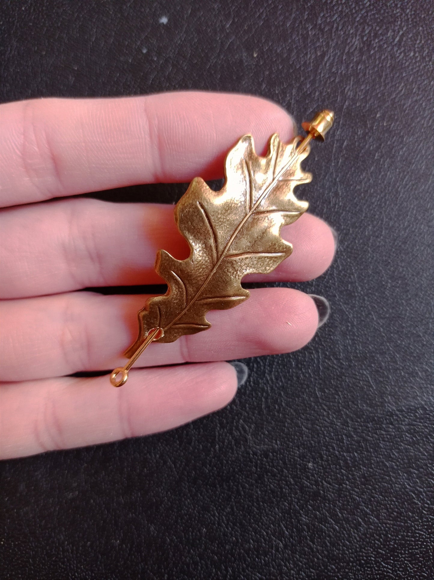 Brass oak leaf brooch