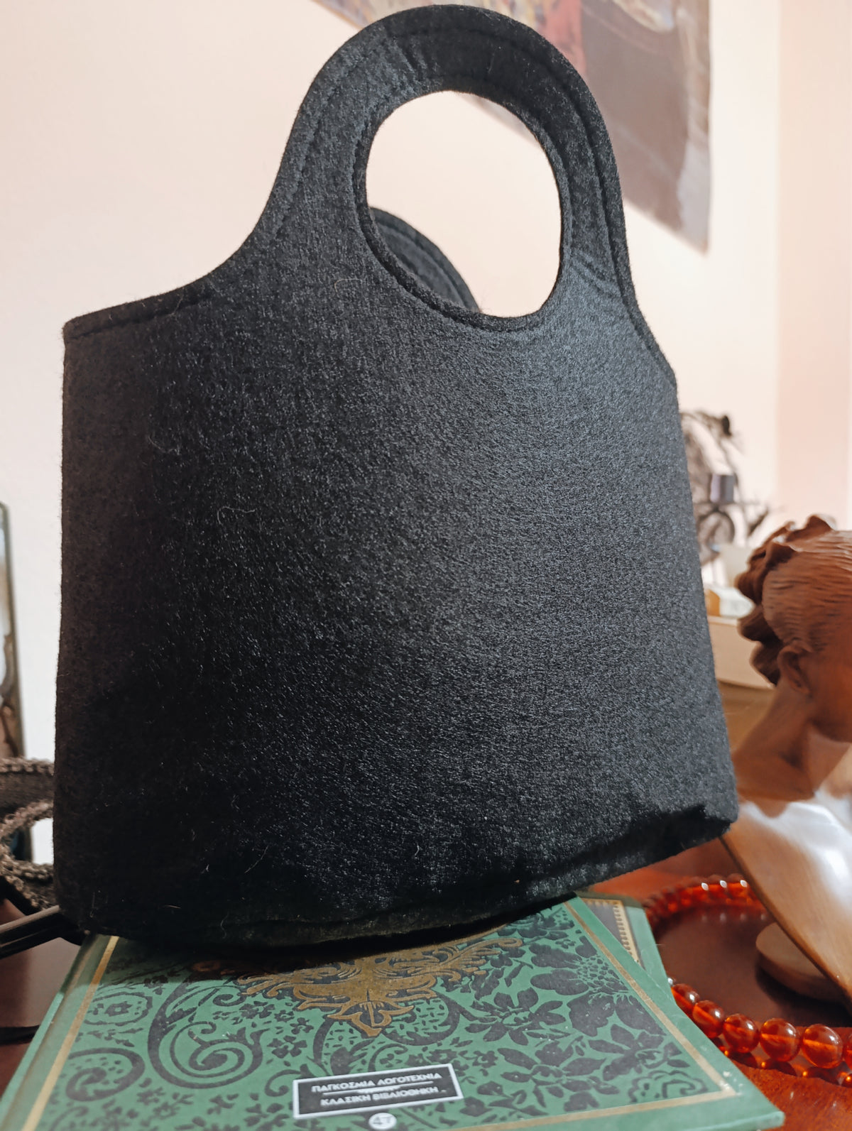 Felt bag with vintage brooches